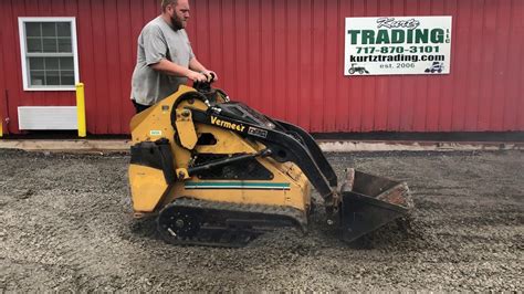 skid steer standing|used stand behind skid steer.